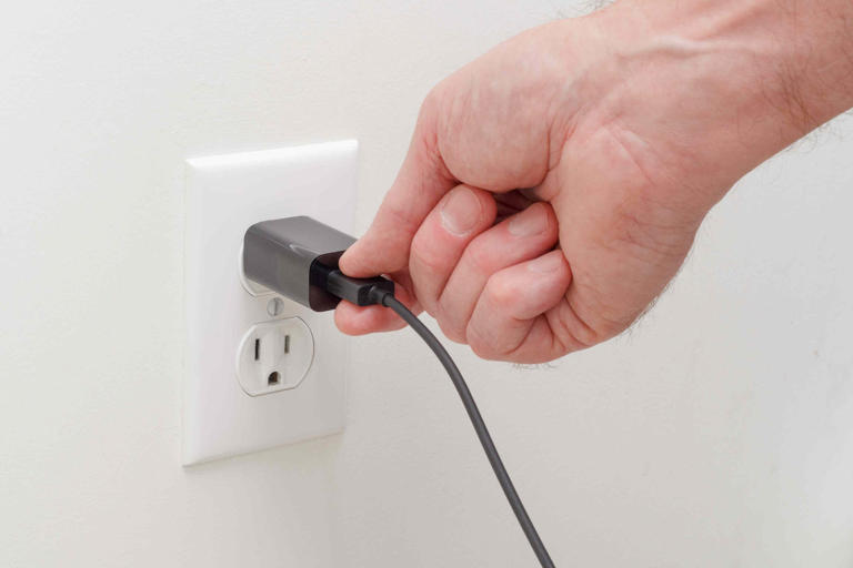 Should You Unplug Chargers When Not in Use? Here's What an Electrician Says